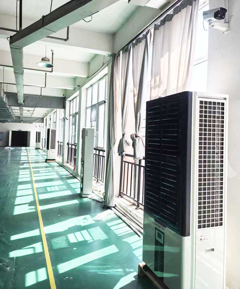 大型制衣廠制冷降溫，應用工業(yè)省電空調(diào)-立式軸流雙風口機組